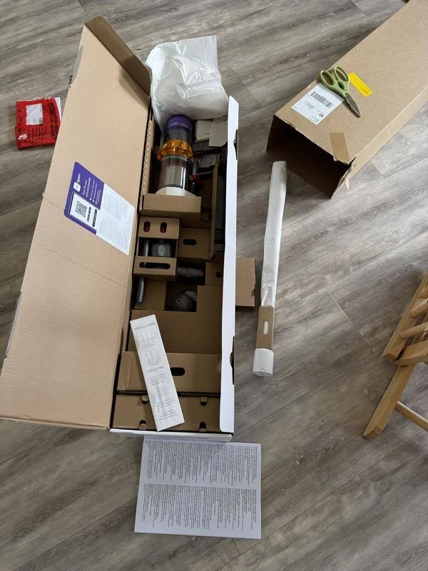 view of testing dyson v15 detect absolute cordless stick vacuum australia unboxing package arrival several weeks to months