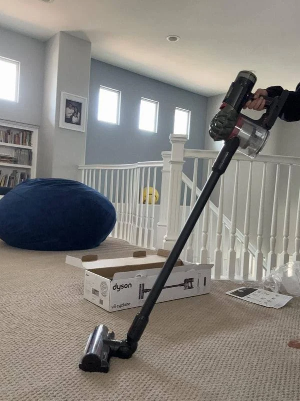 view of testing dyson v8 cyclone cordless stick vacuum australia unboxing package arrival several weeks to months